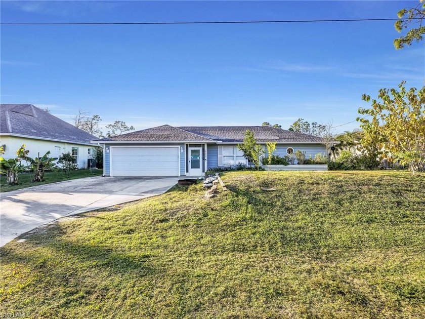 RARE OPPORTUNITY - NO HOA + TROPICAL FRUIT TREE PROPERTY! This - Beach Home for sale in Bonita Springs, Florida on Beachhouse.com