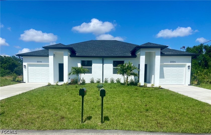 Built in 2023, this modern duplex features 3 bedrooms and 2 - Beach Home for sale in Lehigh Acres, Florida on Beachhouse.com