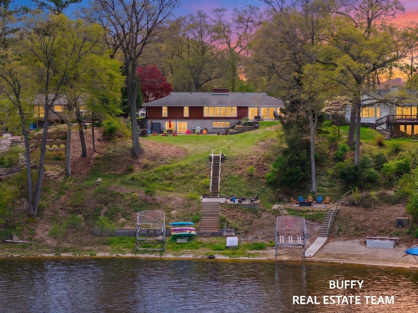 Experience lakefront living with endless potential on beautiful - Beach Home for sale in Norton Shores, Michigan on Beachhouse.com