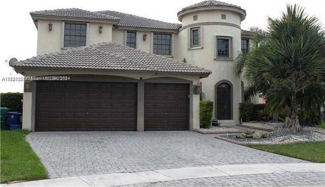 THIS SPECTACULAR  LAKEFRONT HOME IS LOCATED IN SUNSET LAKES - Beach Home for sale in Miramar, Florida on Beachhouse.com