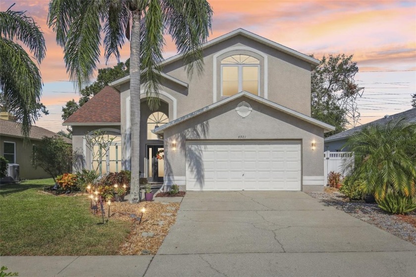 Welcome to 4921 Edgewater Lane in the Heart of East Lake - Beach Home for sale in Oldsmar, Florida on Beachhouse.com