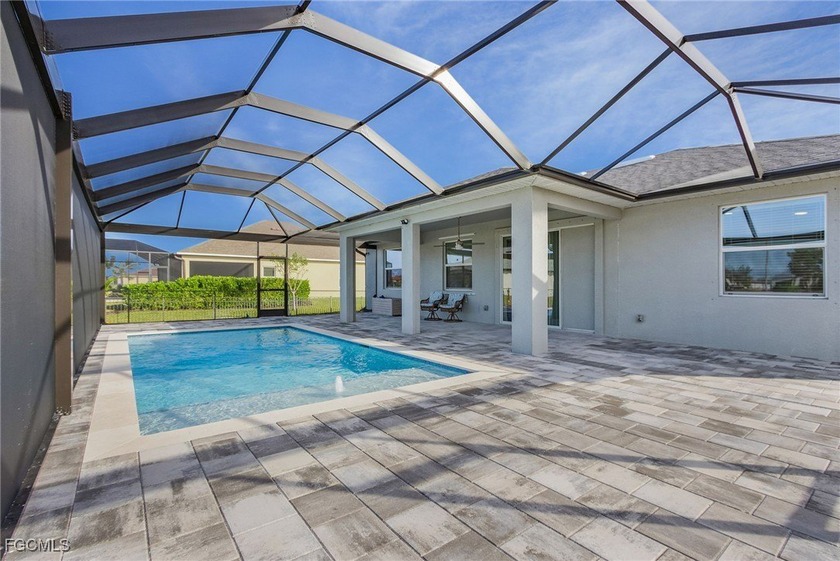 This turnkey 4-bedroom, 2-bathroom pool home comes fully - Beach Home for sale in Cape Coral, Florida on Beachhouse.com