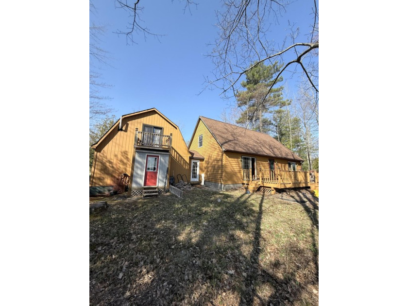 This charming 4-bedroom, 3-bath waterfront home on Birch Lake - Beach Home for sale in Elk Rapids, Michigan on Beachhouse.com