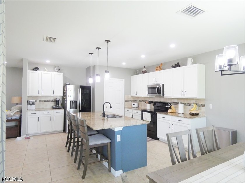 Welcome to this beautifully updated 4 bedroom, 2 bathroom home - Beach Home for sale in Cape Coral, Florida on Beachhouse.com
