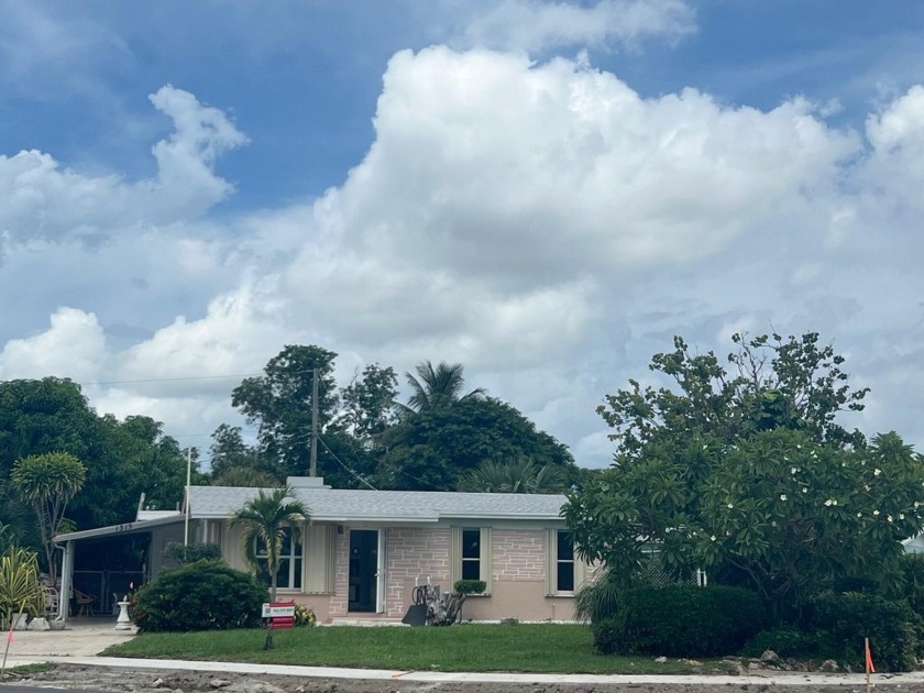 NO HOA or CARPET! New Roof and recently renovated 4 bedrooms, 2 - Beach Home for sale in West Palm Beach, Florida on Beachhouse.com