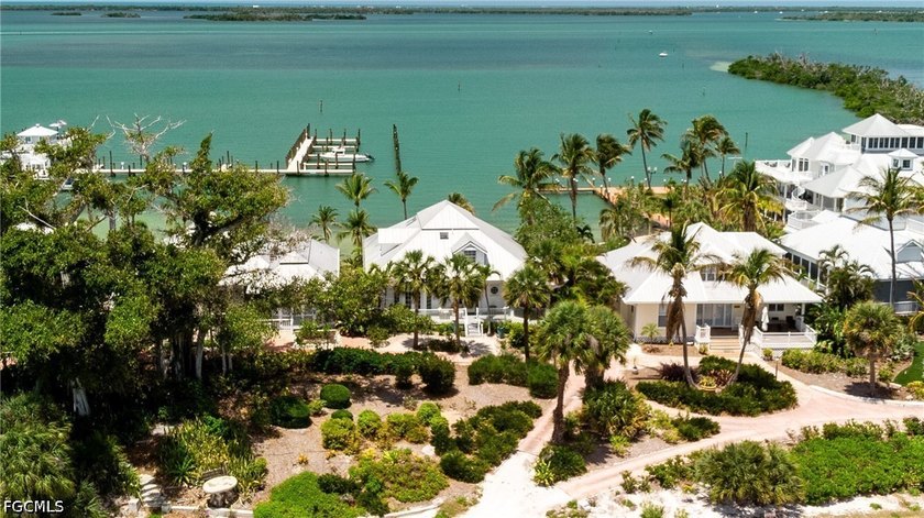 #128 *Twin Shores Cottage* is ideally positioned on the coveted - Beach Home for sale in Useppa Island, Florida on Beachhouse.com