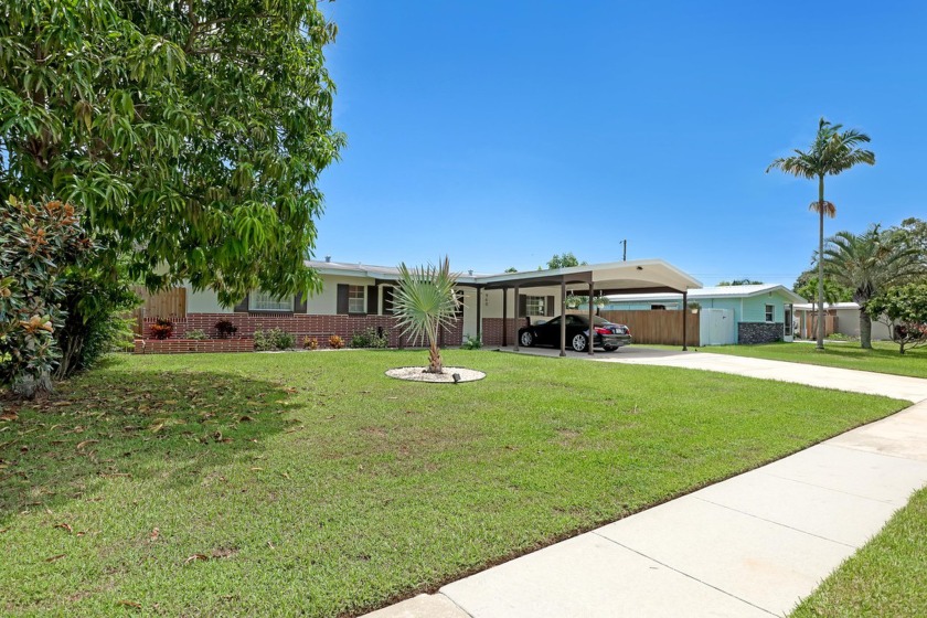 Welcome to this charming four bed 2 bath home nestled in the - Beach Home for sale in Merritt Island, Florida on Beachhouse.com