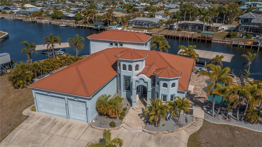 Experience the PINNACLE OF WATERFRONT LUXURY at 290 Tait Terrace - Beach Home for sale in Port Charlotte, Florida on Beachhouse.com