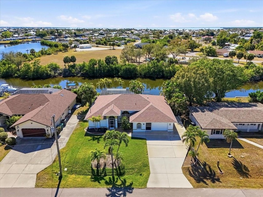 Exceptionally maintained waterfront pool residence offering a - Beach Home for sale in Port Charlotte, Florida on Beachhouse.com