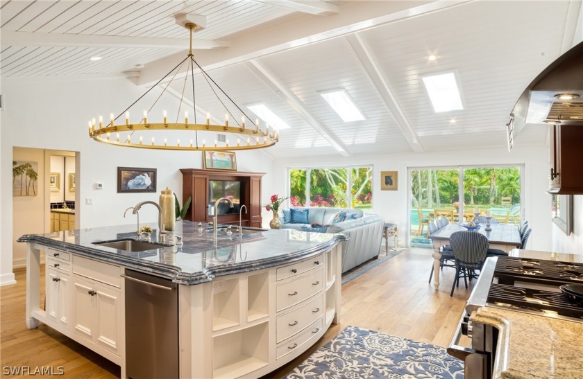 Ideally situated on an oversized, parklike 250' deep waterfront - Beach Home for sale in Sanibel, Florida on Beachhouse.com