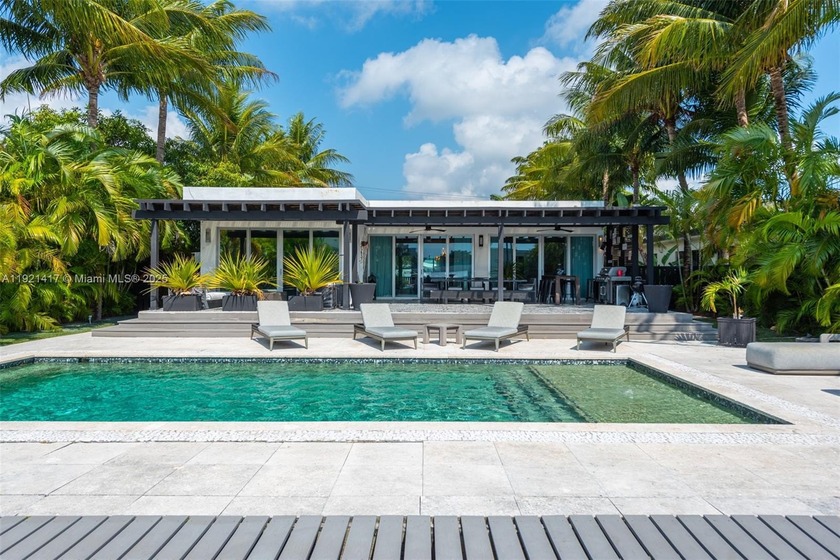 Live in the coveted, gated community of Normandy Shores, known - Beach Home for sale in Miami Beach, Florida on Beachhouse.com