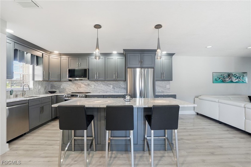 Welcome to 5102 Coronado Parkway #2, an exceptional waterfront - Beach Condo for sale in Cape Coral, Florida on Beachhouse.com