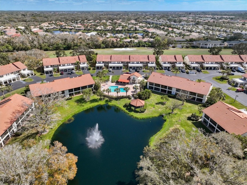 Expansive golf course views paired with a serene water feature - Beach Condo for sale in Venice, Florida on Beachhouse.com