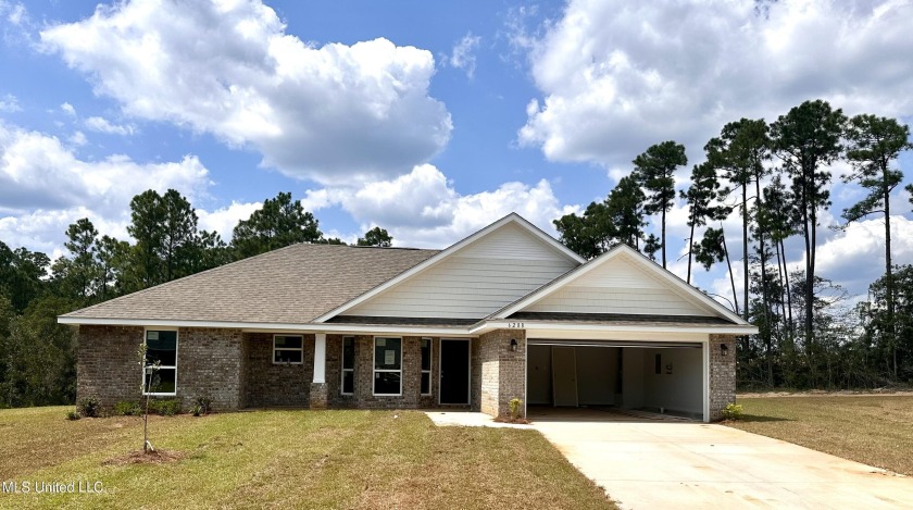 Elegant All-Brick Retreat in a Premier Cul-de-Sac Location - Beach Home for sale in Biloxi, Mississippi on Beachhouse.com