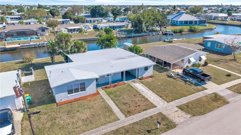 Welcome to your waterfront retreat, where every day feels like a - Beach Home for sale in Port Charlotte, Florida on Beachhouse.com