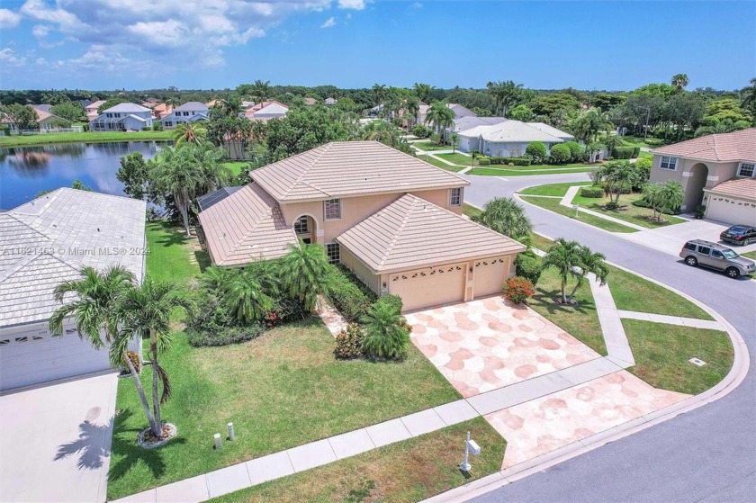 Corner Lot! Beautiful Pool and Lakefront View. Porcelain and - Beach Home for sale in Lake Worth, Florida on Beachhouse.com