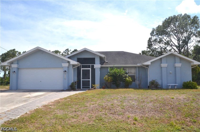 This beautiful, move-in ready home has everything you've been - Beach Home for sale in Lehigh Acres, Florida on Beachhouse.com