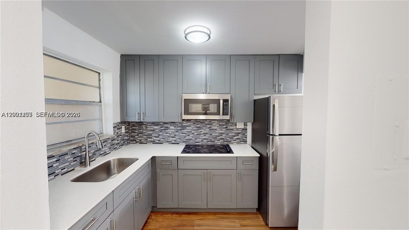 This fully renovated 2 Bedroom / 1 Bath corner unit with an - Beach Condo for sale in Miami, Florida on Beachhouse.com