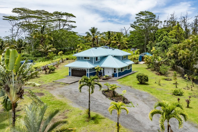 Discover your tropical retreat with this spacious 4-bedroom home - Beach Home for sale in Keaau, Hawaii on Beachhouse.com