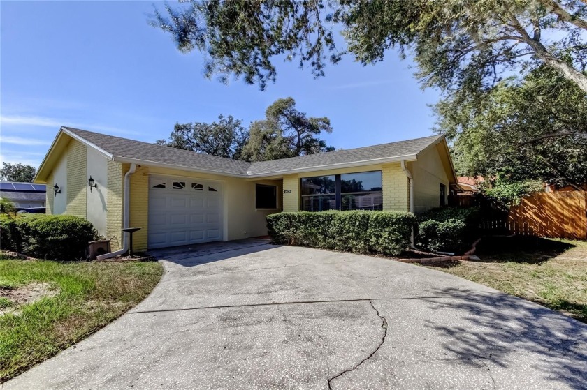 Welcome to this CHARMING, Move-In-Ready, 3-Bedroom, 2-Bath, 1 - Beach Home for sale in Tarpon Springs, Florida on Beachhouse.com