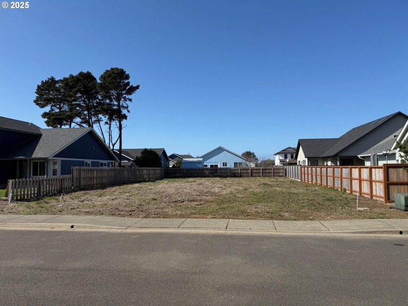 BANDON OCEAN TRAILS large level lot on quiet street with view of - Beach Lot for sale in Bandon, Oregon on Beachhouse.com