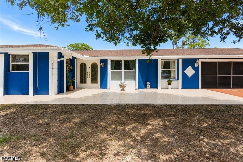 Spacious 4-bedroom, 3-bath home with over 2,000 sq ft of living - Beach Home for sale in Lehigh Acres, Florida on Beachhouse.com