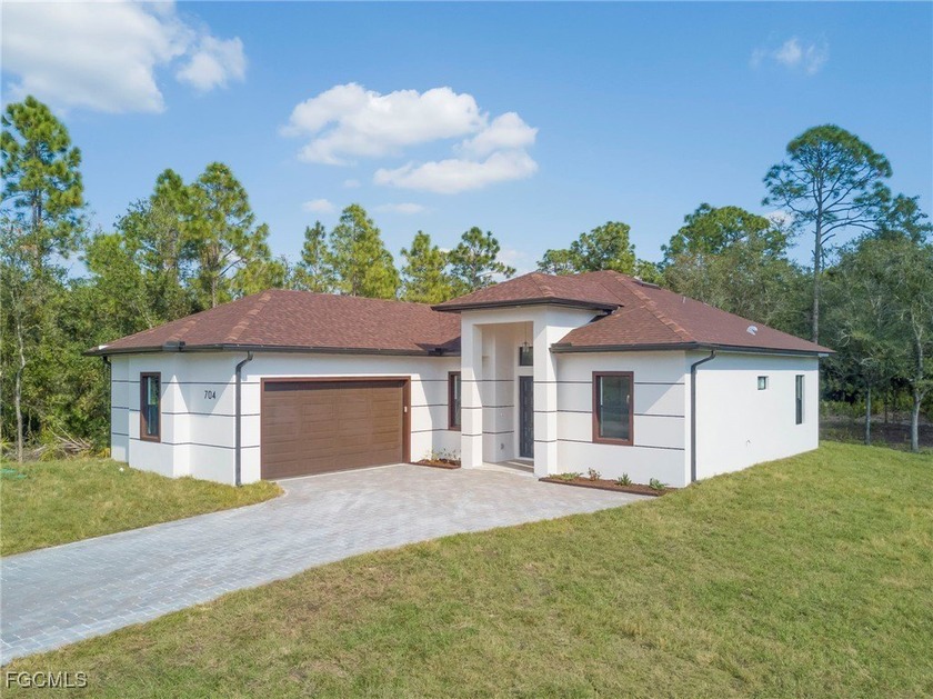 Stunning New Construction - 3 Bedroom, 2 Bath Home on Half-Acre - Beach Home for sale in Lehigh Acres, Florida on Beachhouse.com
