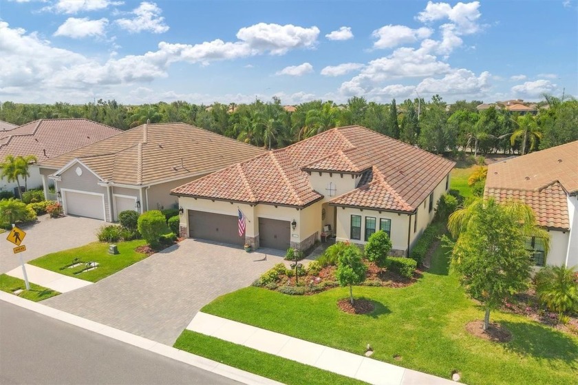 MODEL QUALITY 4 BED + DEN / 3 BATH / 3 CAR GARAGE 2,758 SQFT - Beach Home for sale in Lakewood Ranch, Florida on Beachhouse.com