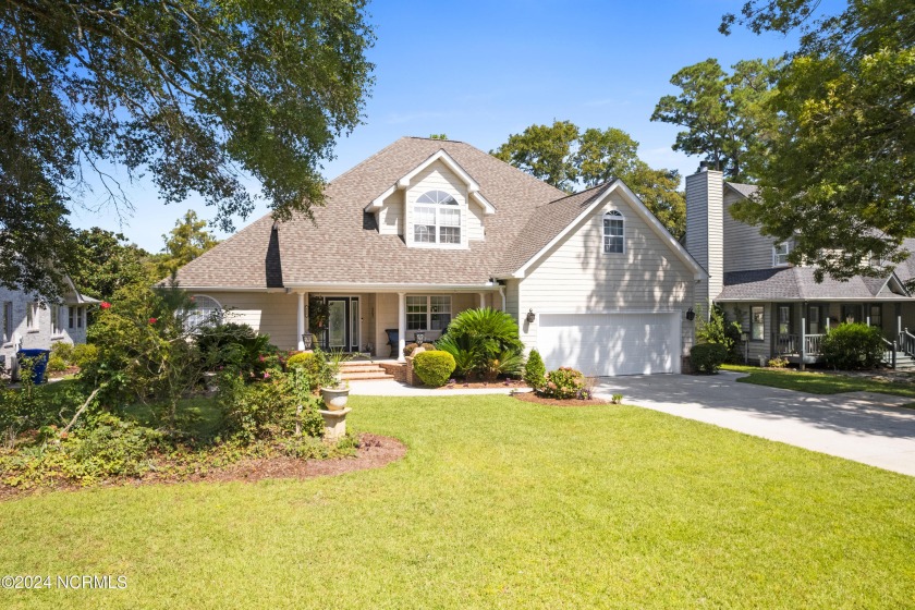 This meticulously maintained home with views of Sunset Lake - Beach Home for sale in Sunset Beach, North Carolina on Beachhouse.com