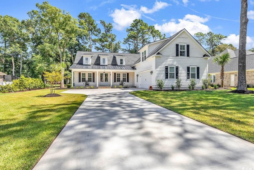 Welcome to 95 Red Tail Hawk Loop, a stunning residence nestled - Beach Home for sale in Pawleys Island, South Carolina on Beachhouse.com