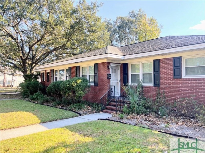 Discover this beautiful brick duplex, ideally located in the - Beach Townhome/Townhouse for sale in Savannah, Georgia on Beachhouse.com