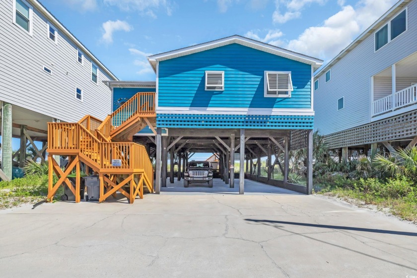 You MUST SEE this OCEANFRONT, raised beach home! A place where - Beach Home for sale in Garden City Beach, South Carolina on Beachhouse.com