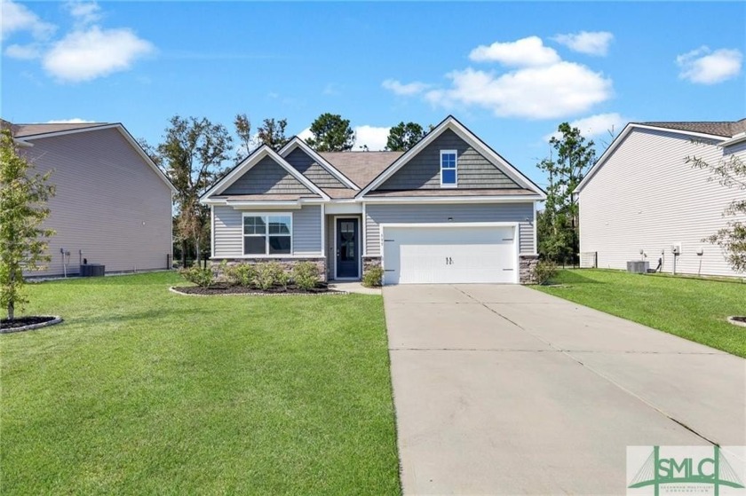 This beautiful home located in the sought-after Ways Station - Beach Home for sale in Richmond Hill, Georgia on Beachhouse.com