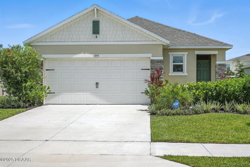 Discover the exceptional value of this pristine 2023 DR Horton - Beach Home for sale in Ormond Beach, Florida on Beachhouse.com