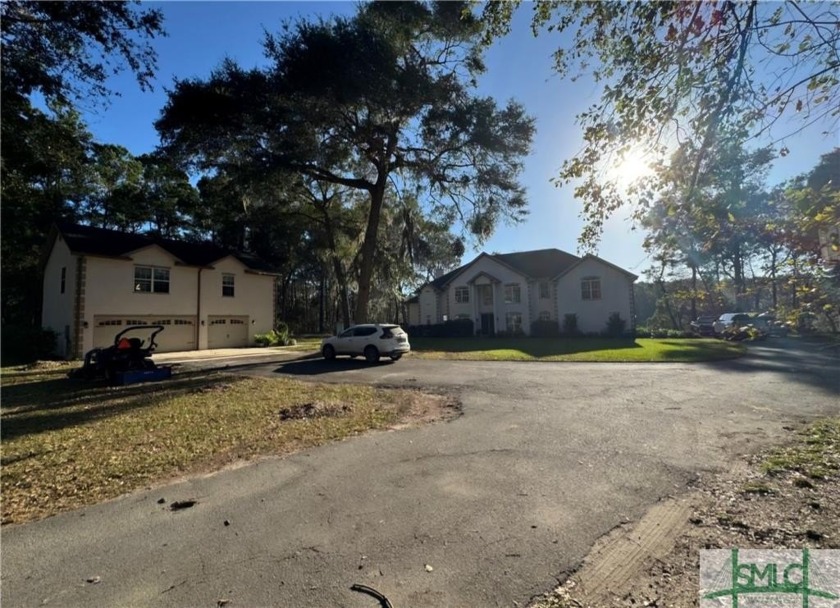 Discover your private oasis in this exquisite 5-bedroom, 4 - Beach Home for sale in Richmond Hill, Georgia on Beachhouse.com