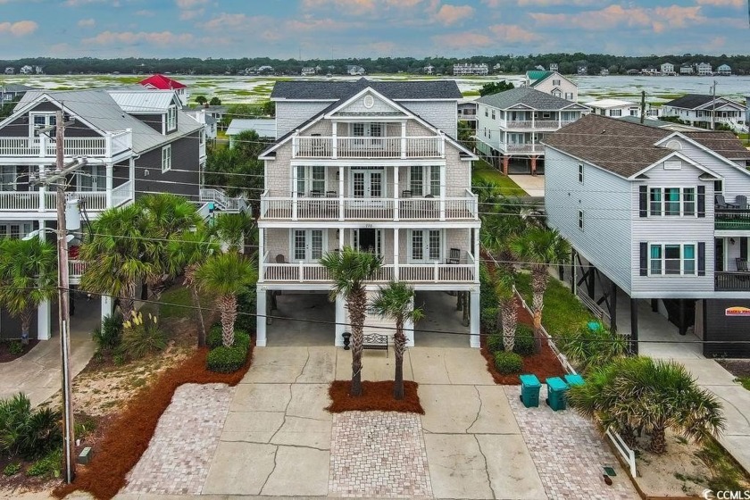 Welcome to your family's dream beach retreat! This stunning - Beach Home for sale in Garden City Beach, South Carolina on Beachhouse.com