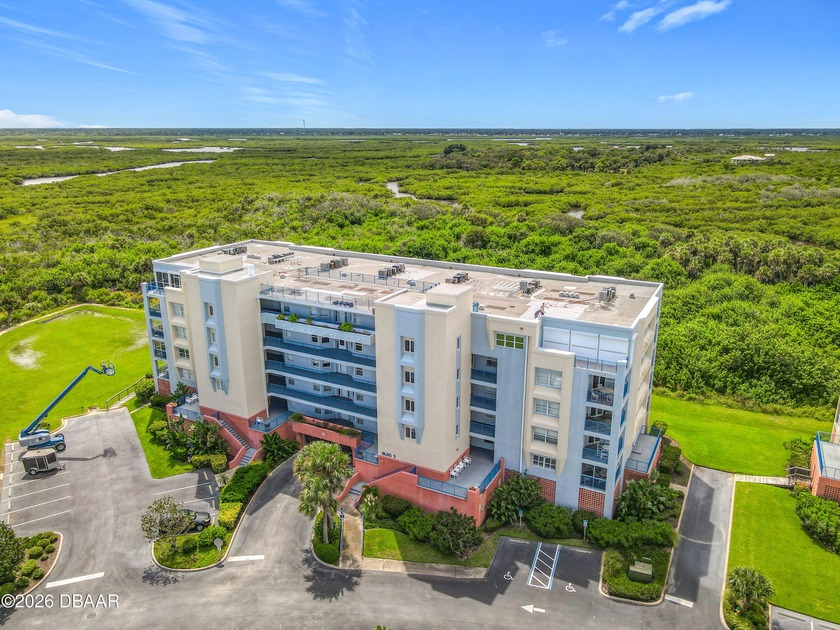 Step into luxurious coastal living with this stunning 3-bedroom - Beach Condo for sale in New Smyrna Beach, Florida on Beachhouse.com