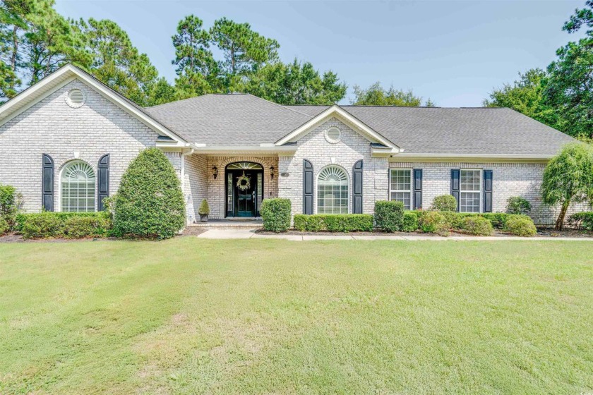 This gorgeous custom-built, all-brick home in the stunning - Beach Home for sale in Pawleys Island, South Carolina on Beachhouse.com