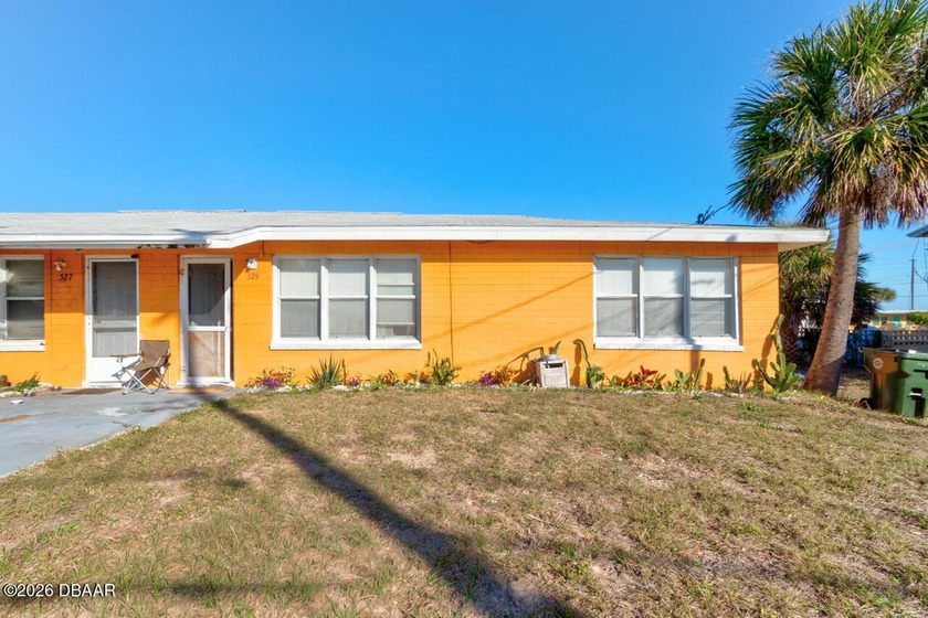 Versatile duplex offering two fully self-contained living units - Beach Home for sale in Daytona Beach, Florida on Beachhouse.com