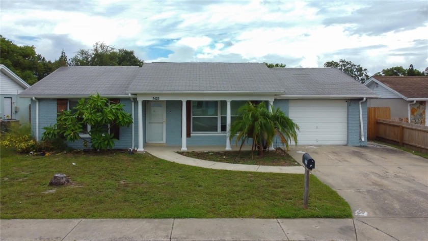 Auction Property. This lovely 3 bedroom, 2 bath home offers a - Beach Home for sale in Port Richey, Florida on Beachhouse.com
