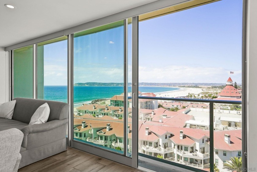 The panoramic views from this corner unit offer a *front row* - Beach Home for sale in Coronado, California on Beachhouse.com