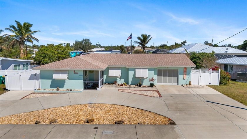 $20,000 REDUCTION! Waterfront property with a dock and covered - Beach Home for sale in Port Charlotte, Florida on Beachhouse.com