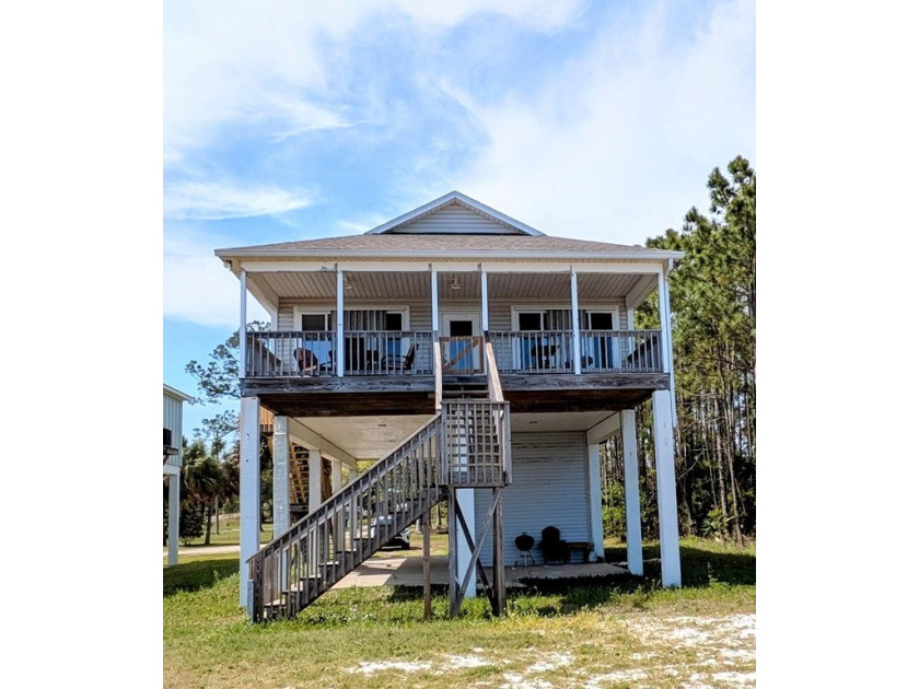 Enjoy the best of bayside living in this beautifully furnished - Beach Home for sale in Carabelle, Florida on Beachhouse.com