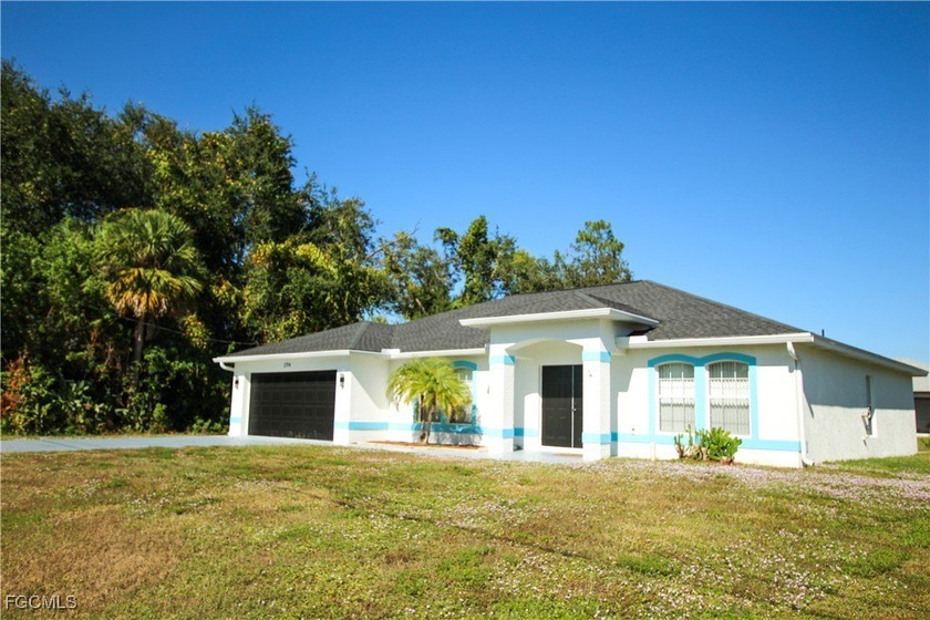 Welcome to this well-located pool property in the heart of - Beach Home for sale in Lehigh Acres, Florida on Beachhouse.com