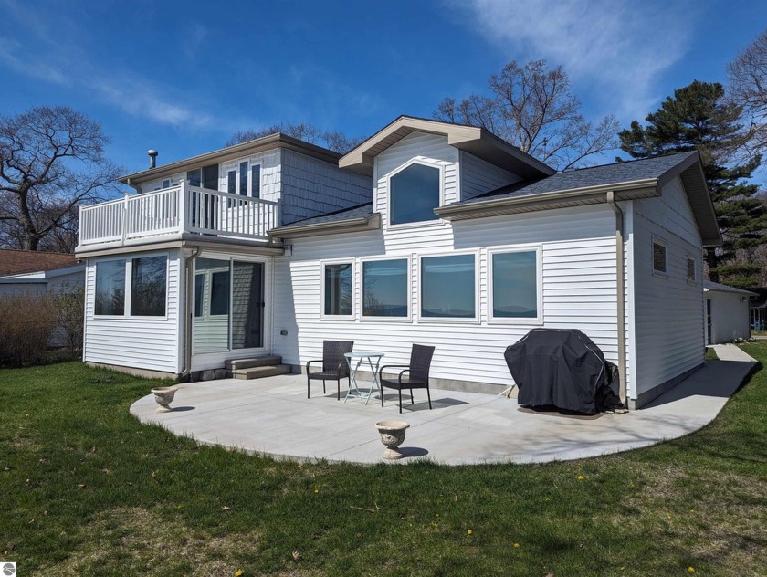 Come home to vacation!  This immaculate home with 66' of - Beach Home for sale in Au Gres, Michigan on Beachhouse.com
