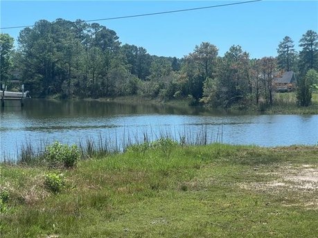 Come build your dream Waterfront Home on this Waterfront 1.5 - Beach Lot for sale in Port Haywood, Virginia on Beachhouse.com