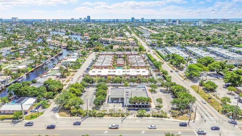 Corner unit 2BR/2BA with open kitchen featuring light-brown - Beach Condo for sale in Pompano Beach, Florida on Beachhouse.com