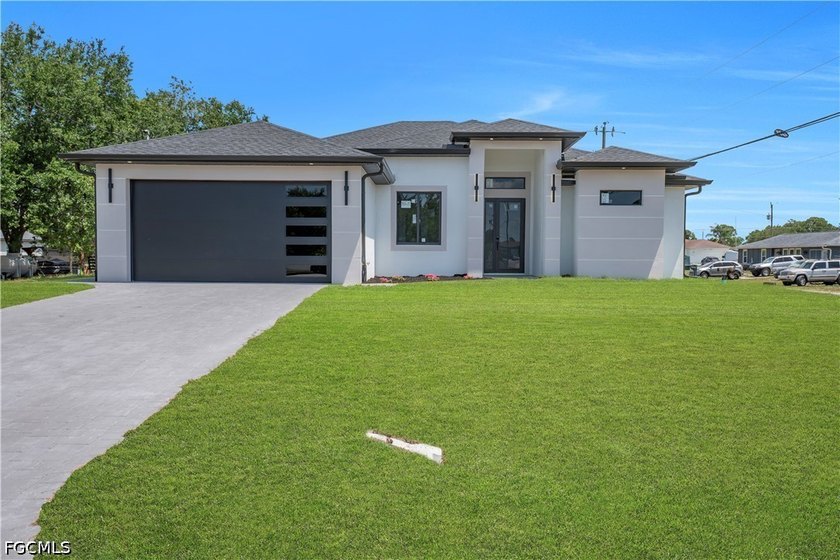 Welcome to this striking new construction home in Lehigh Acres - Beach Home for sale in Lehigh Acres, Florida on Beachhouse.com