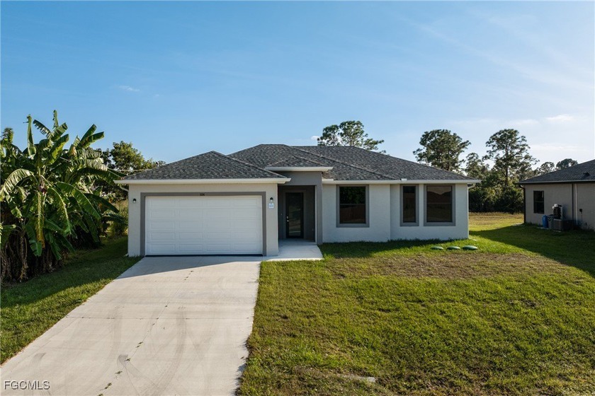 Brand-new construction featuring 3 bedrooms and 2 bathrooms with - Beach Home for sale in Lehigh Acres, Florida on Beachhouse.com