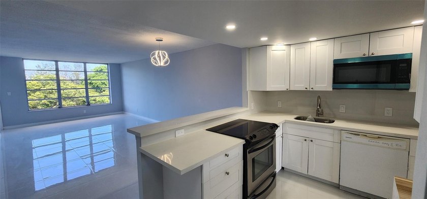 Spacious Remodel VERY BRIGHT Golf and Pool view Partial Impact - Beach Condo for sale in Pompano Beach, Florida on Beachhouse.com